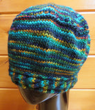 Cable Brim Hat in Merino DK Single Ply in Peacock