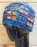 Honey Comb Hat in SW Merino - Bulky Common Grackle/Amber