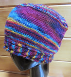 Cable Brim Hat in Merino DK Single Ply in Hibiscus